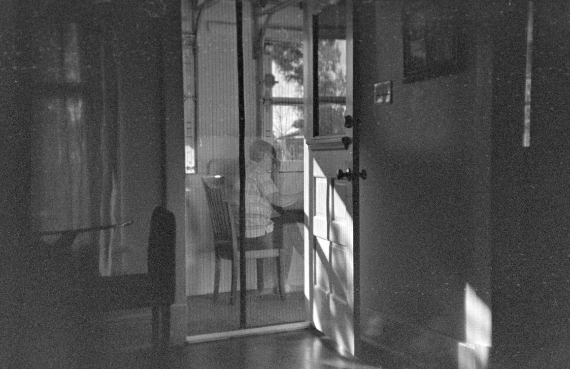 Mom, writing on the porch, Denver